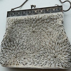 Vintage beaded bag with silver colored metal frame